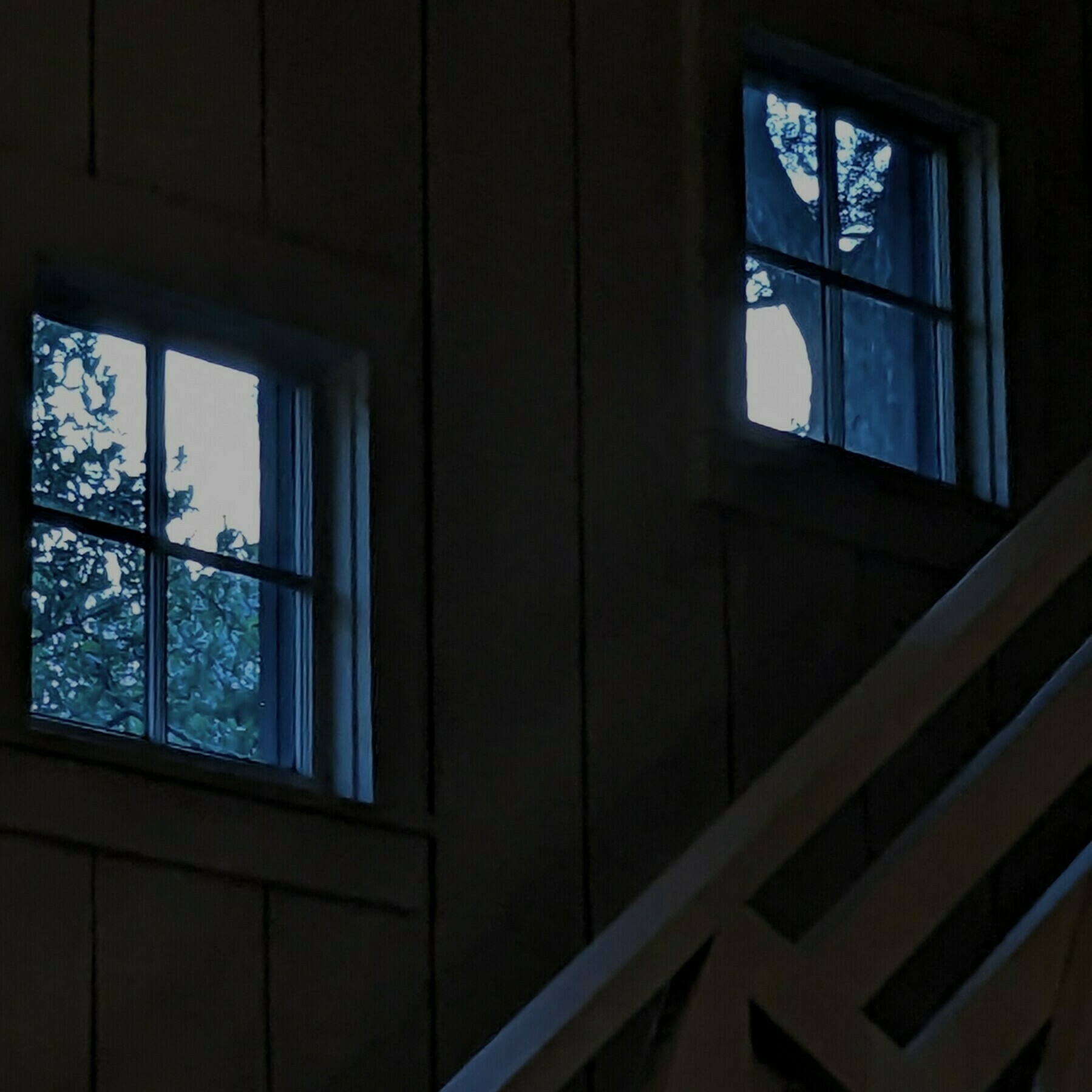 Two windows at dusk