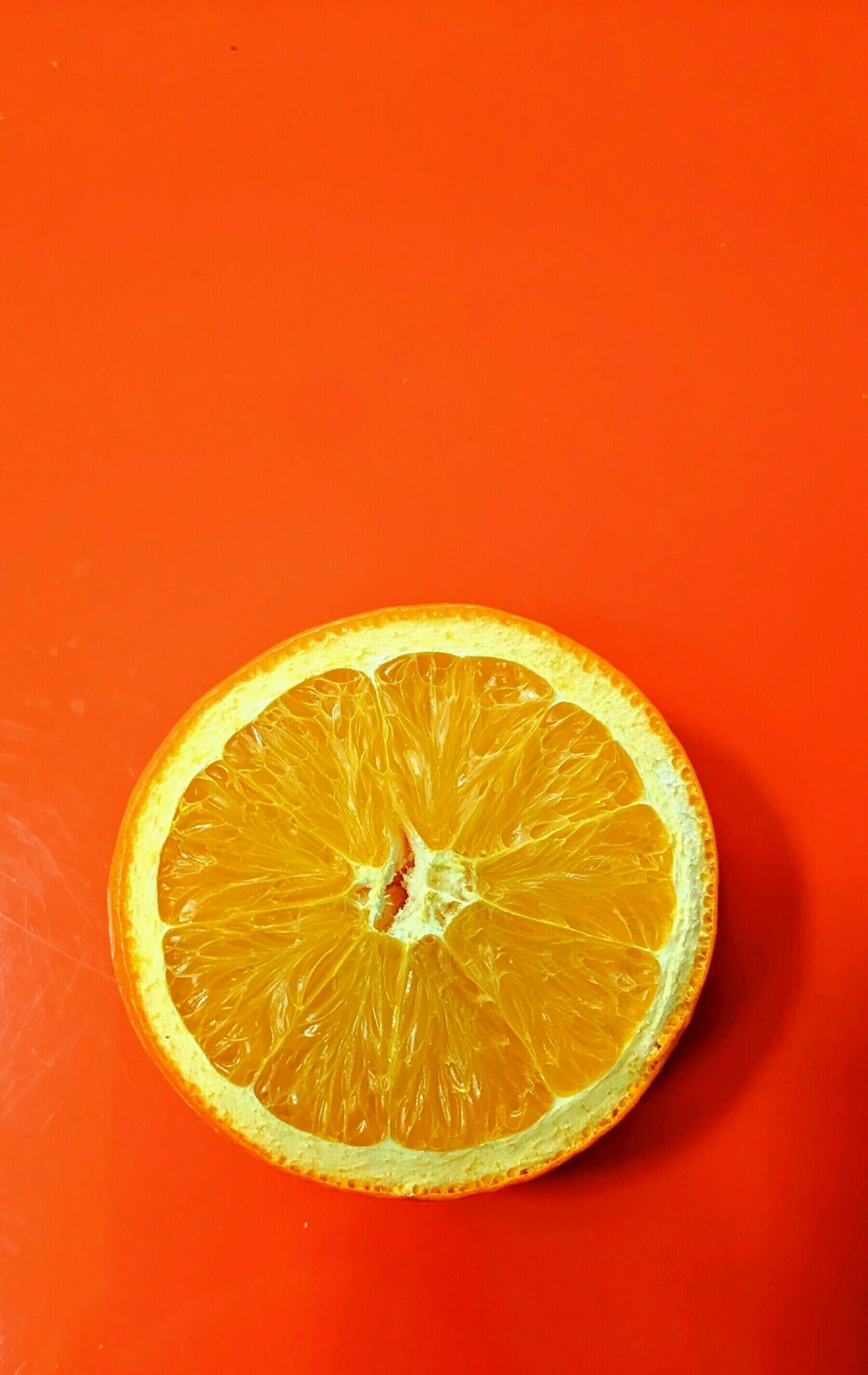 Orange slice on an orange tray