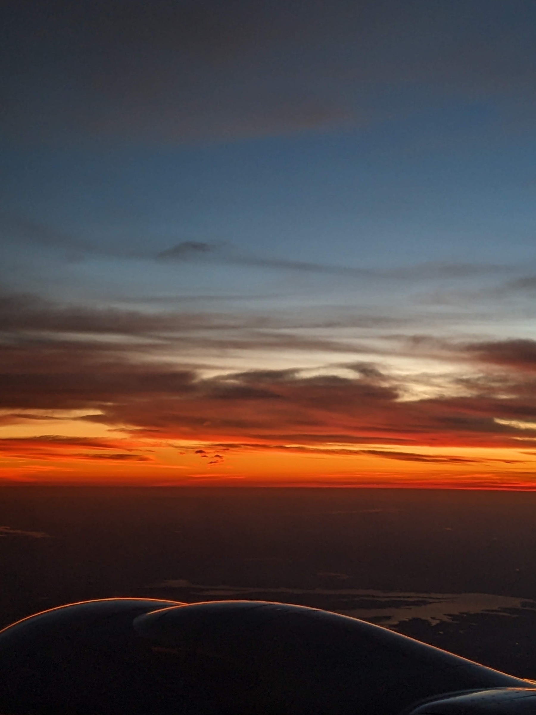 sunrise out of a plane window