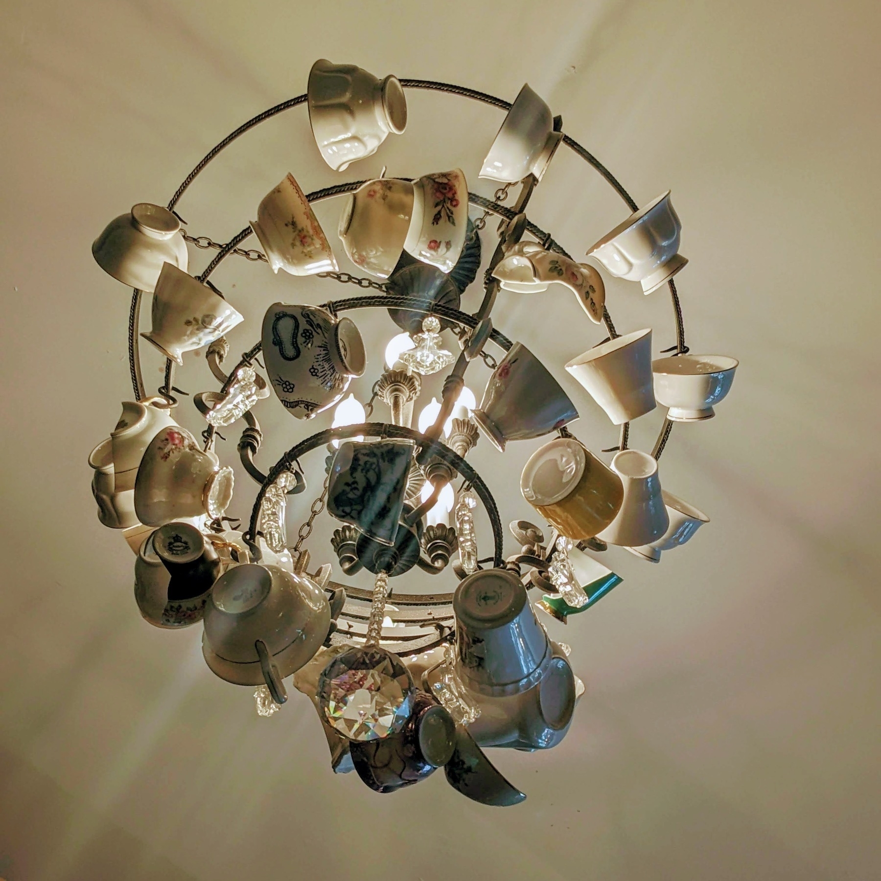 a chandelier made of teacups